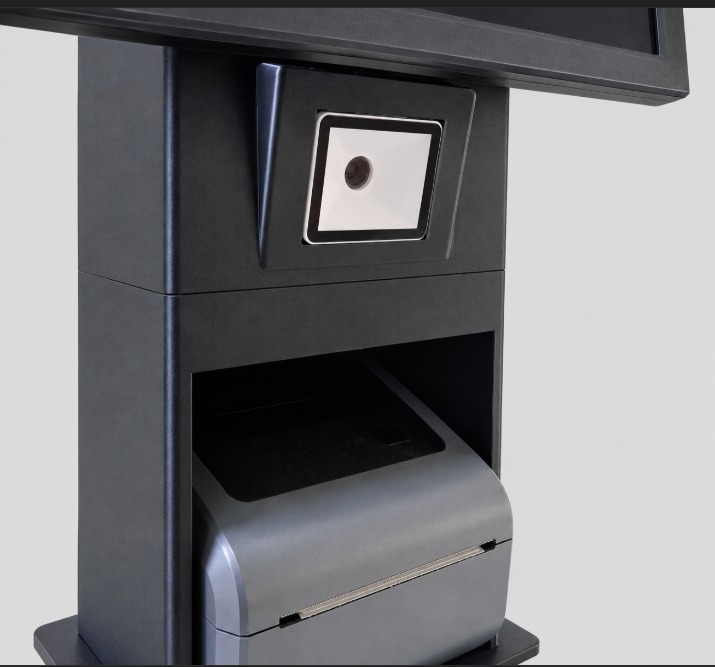 Close-up of the QR scanner window and thermal printer bay
